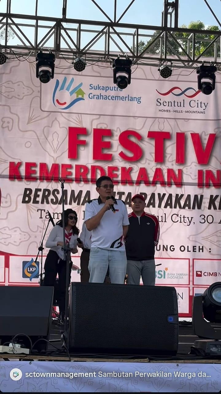 Ketua Harmony Community menyampaikan sambutan dalam kegiatan warga